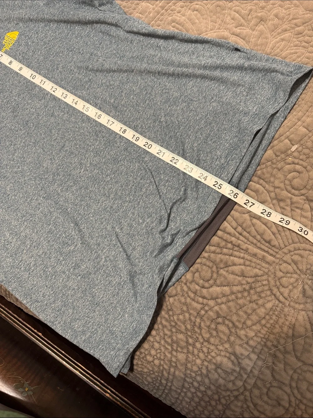 The North Face Men's Heathered Blue V‑Neck Performance Tee dark blue Accents
